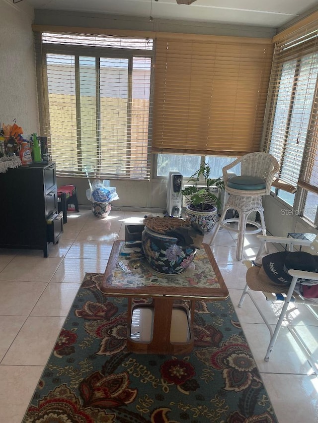 living area featuring light tile patterned flooring