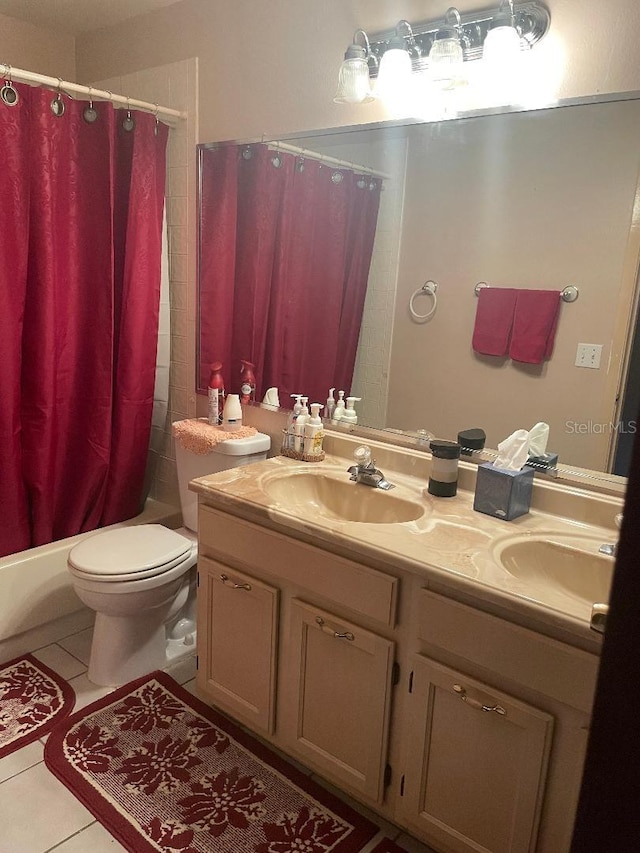 full bathroom with tile patterned floors, double vanity, shower / tub combo with curtain, and a sink