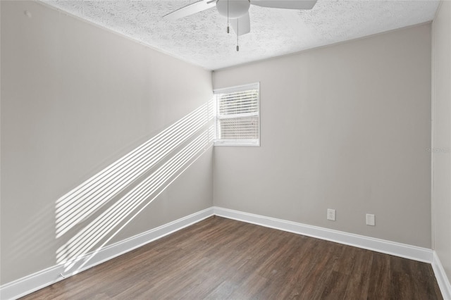 unfurnished room with dark wood finished floors, a textured ceiling, baseboards, and ceiling fan