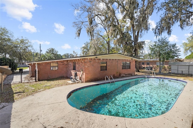 view of pool featuring a fenced in pool, a patio, and fence