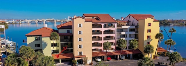 732 Marina Point Dr Unit 7320, Daytona Beach, FL 32114 - view of building exterior featuring a water view
