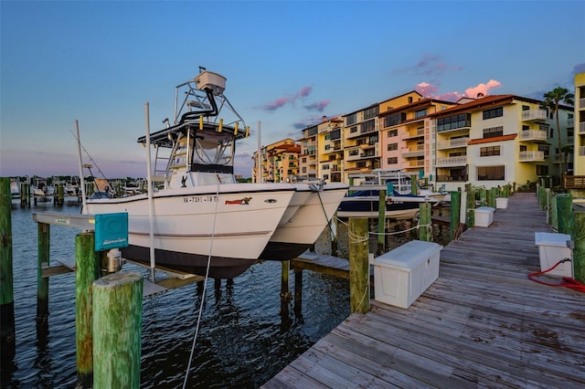 732 Marina Point Dr Unit 7320, Daytona Beach, FL 32114 - view of dock featuring boat lift and a water view