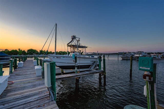 732 Marina Point Dr Unit 7320, Daytona Beach, FL 32114 - view of dock featuring boat lift and a water view