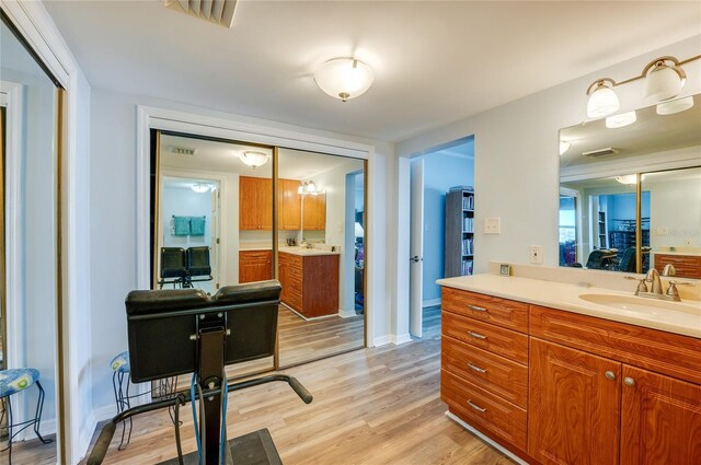 732 Marina Point Dr Unit 7320, Daytona Beach, FL 32114 - bathroom featuring vanity, wood finished floors, and visible vents
