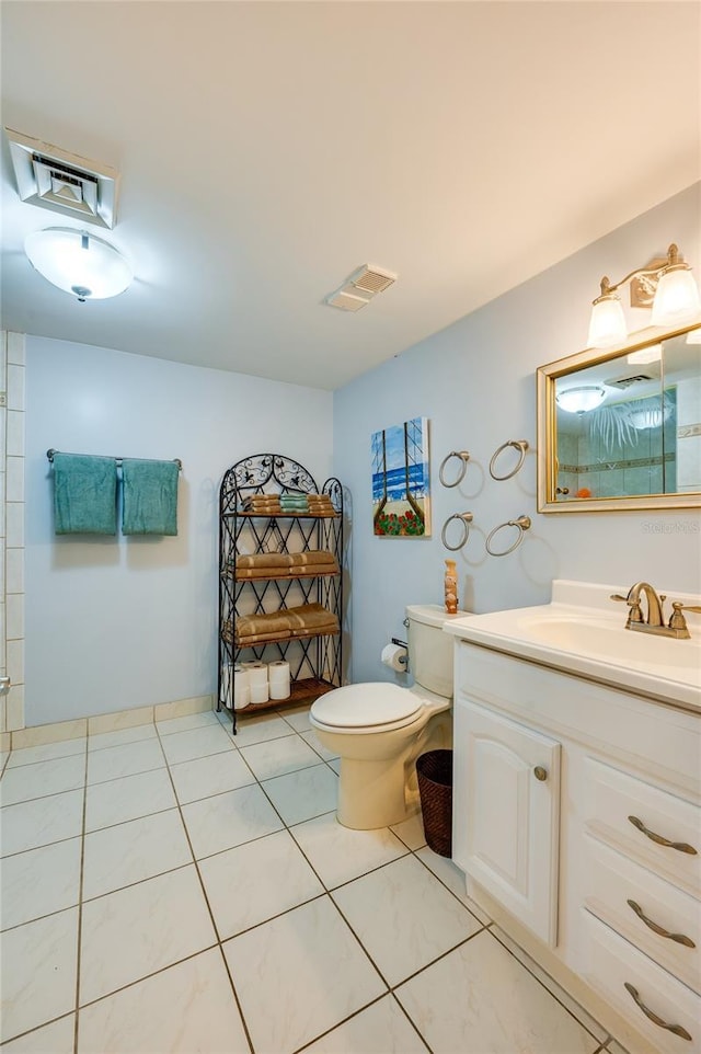 732 Marina Point Dr Unit 7320, Daytona Beach, FL 32114 - full bath with visible vents, toilet, vanity, and tile patterned flooring