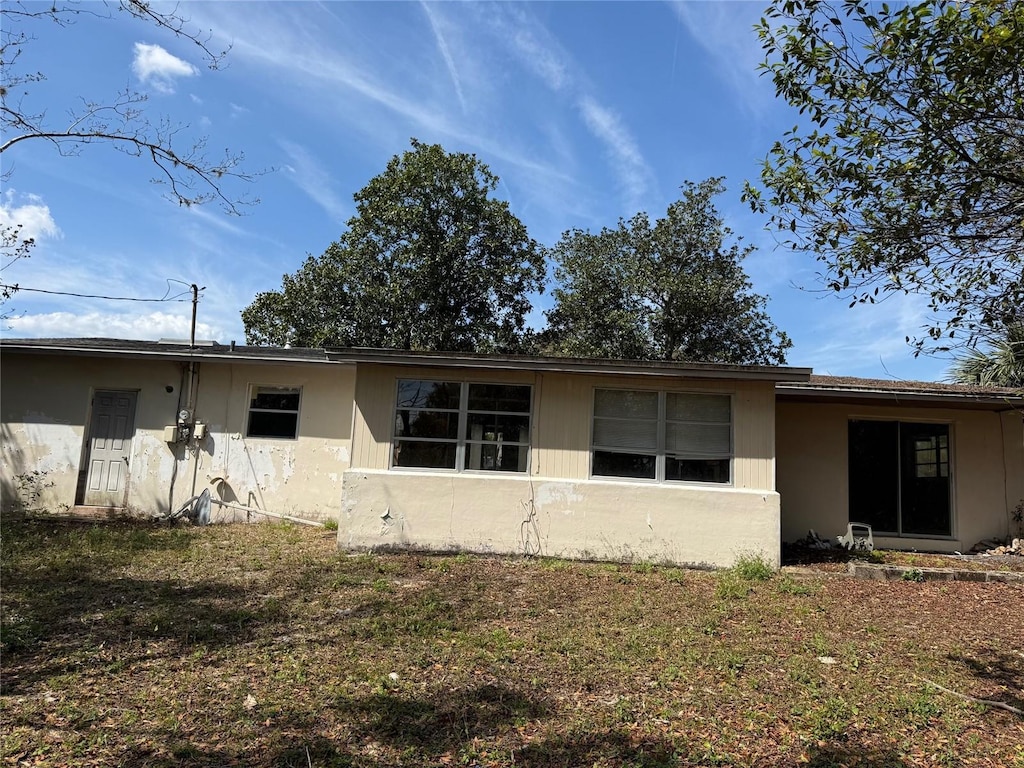 exterior space with stucco siding