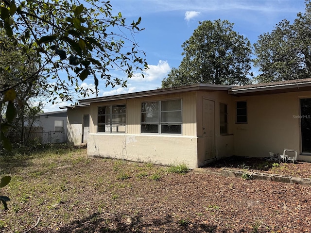 exterior space with fence