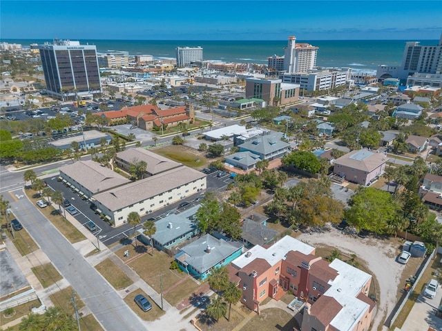 aerial view featuring a water view and a city view
