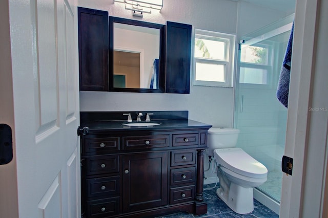 full bath featuring vanity, toilet, and a stall shower