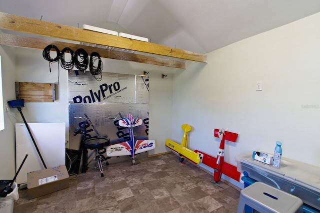 game room featuring vaulted ceiling