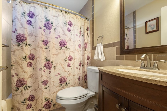 723 Pelican Ct, Kissimmee, FL 34759 - bathroom with toilet, tile walls, vanity, and shower / bath combination with curtain