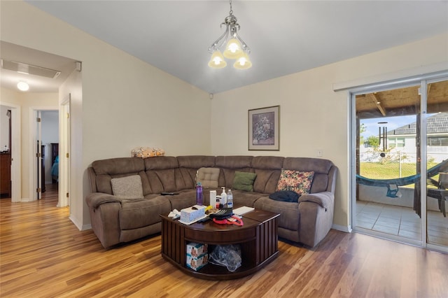 723 Pelican Ct, Kissimmee, FL 34759 - living area with visible vents, baseboards, and light wood-style floors
