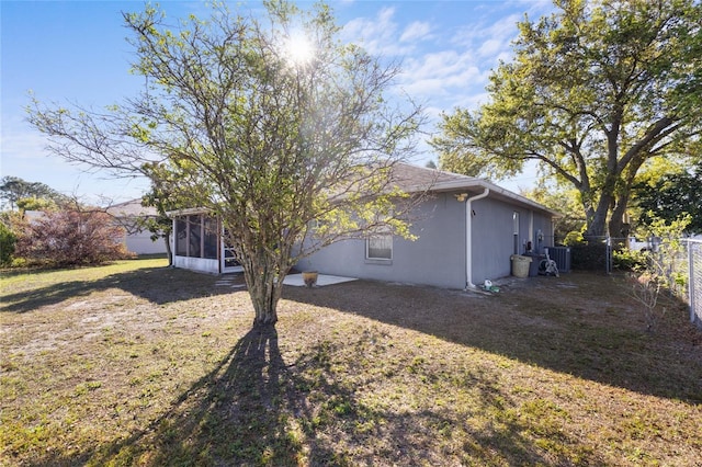 723 Pelican Ct, Kissimmee, FL 34759 - exterior space with fence and a sunroom
