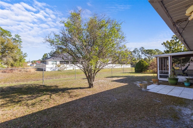 723 Pelican Ct, Kissimmee, FL 34759 - view of yard with fence and a sunroom