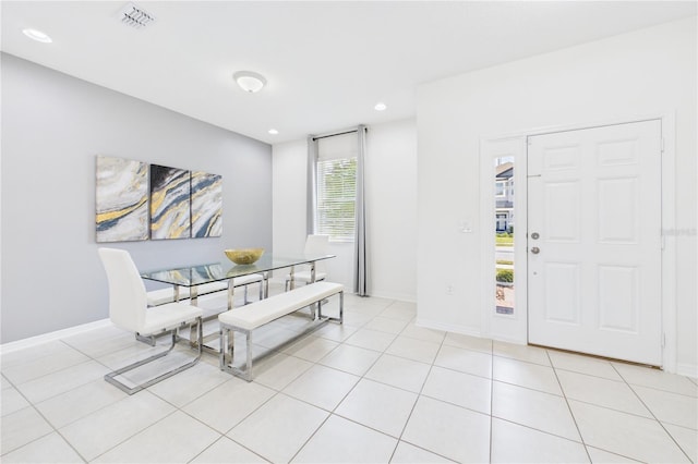 2090 Prairie Sage Ln, Longwood, FL 32750 - dining area with baseboards, visible vents, and light tile patterned floors