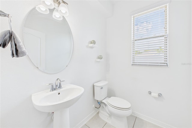 2090 Prairie Sage Ln, Longwood, FL 32750 - half bathroom featuring baseboards, toilet, and tile patterned floors