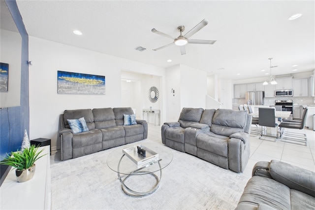2090 Prairie Sage Ln, Longwood, FL 32750 - living area featuring light tile patterned flooring, ceiling fan, visible vents, and recessed lighting