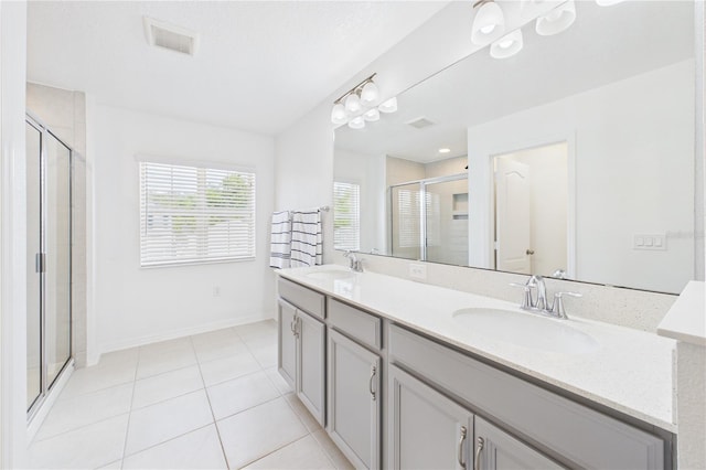 2090 Prairie Sage Ln, Longwood, FL 32750 - full bath featuring a sink, tile patterned floors, and a shower stall
