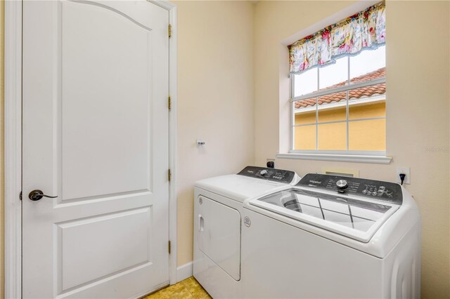 3145 Connemara Dr, Ormond Beach, FL 32174 - laundry area featuring washing machine and clothes dryer