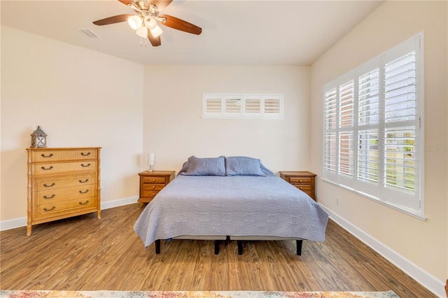 3145 Connemara Dr, Ormond Beach, FL 32174 - bedroom featuring wood finished floors, baseboards, and ceiling fan