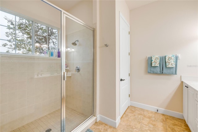 3145 Connemara Dr, Ormond Beach, FL 32174 - bathroom with a stall shower, baseboards, and vanity