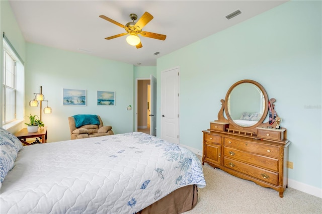 3145 Connemara Dr, Ormond Beach, FL 32174 - bedroom featuring carpet floors, ceiling fan, and baseboards