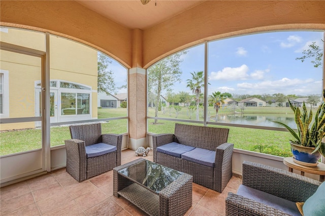 3145 Connemara Dr, Ormond Beach, FL 32174 - sunroom featuring an outdoor hangout area, a water view, and a residential view