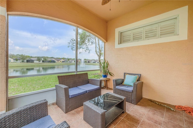 3145 Connemara Dr, Ormond Beach, FL 32174 - sunroom / solarium with a water view, a ceiling fan, and an outdoor living space