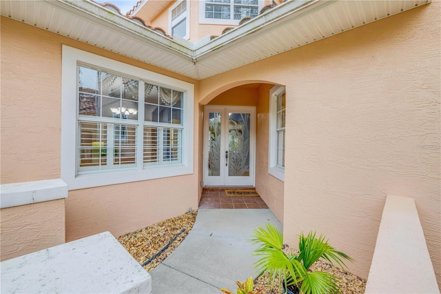 3145 Connemara Dr, Ormond Beach, FL 32174 - entrance to property featuring stucco siding and french doors