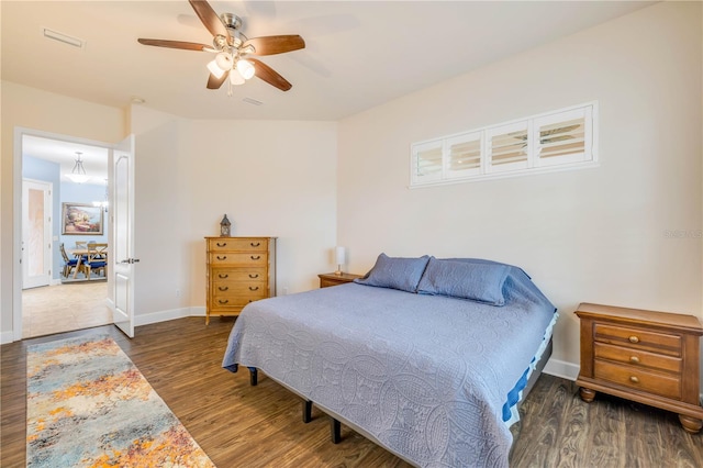 3145 Connemara Dr, Ormond Beach, FL 32174 - bedroom with wood finished floors, baseboards, and ceiling fan