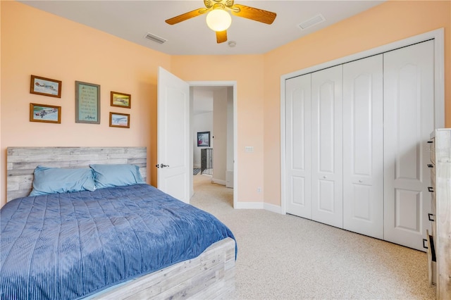 3145 Connemara Dr, Ormond Beach, FL 32174 - carpeted bedroom with a closet, ceiling fan, and baseboards