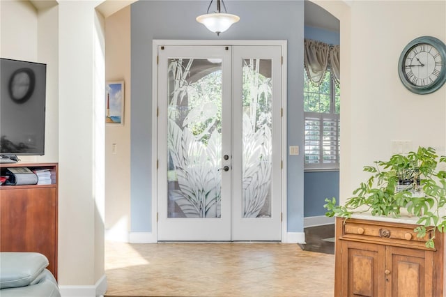 3145 Connemara Dr, Ormond Beach, FL 32174 - entryway featuring french doors and arched walkways