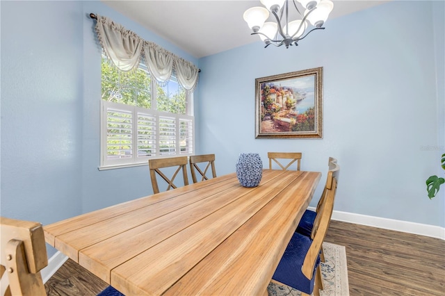 3145 Connemara Dr, Ormond Beach, FL 32174 - dining area featuring a chandelier and wood finished floors