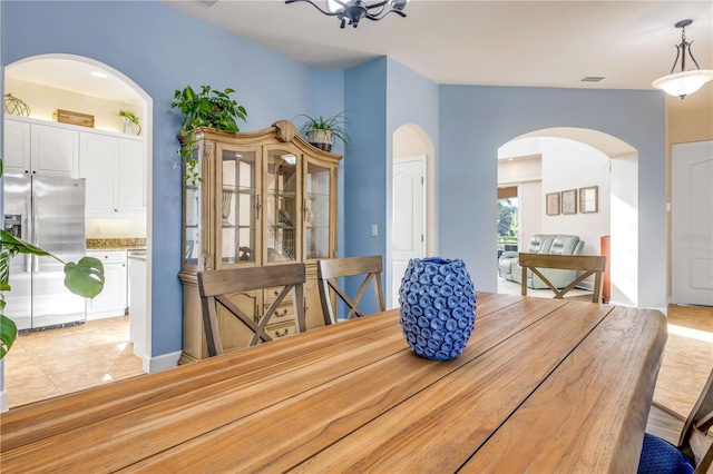3145 Connemara Dr, Ormond Beach, FL 32174 - dining room featuring arched walkways