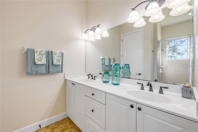 3145 Connemara Dr, Ormond Beach, FL 32174 - bathroom featuring double vanity and a shower stall