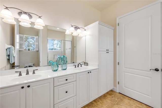 3145 Connemara Dr, Ormond Beach, FL 32174 - bathroom featuring double vanity and an enclosed shower