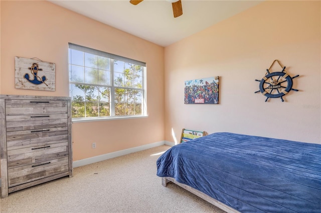 3145 Connemara Dr, Ormond Beach, FL 32174 - bedroom with carpet and a ceiling fan
