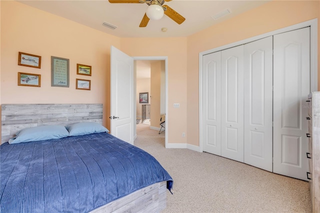 3145 Connemara Dr, Ormond Beach, FL 32174 - bedroom featuring carpet flooring, a ceiling fan, and a closet