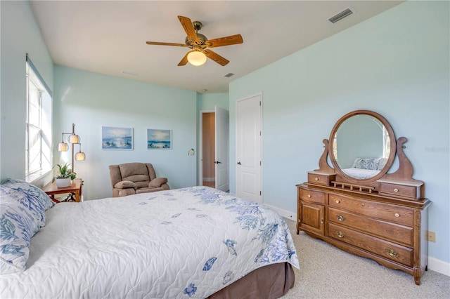 3145 Connemara Dr, Ormond Beach, FL 32174 - carpeted bedroom featuring baseboards and ceiling fan