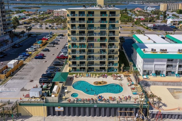 birds eye view of property with a water view