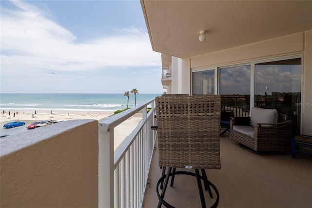2967 S Atlantic Ave Unit 301, Daytona Beach Shores, FL 32118 - balcony featuring view of water and beach