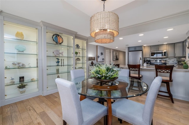 2967 S Atlantic Ave Unit 301, Daytona Beach Shores, FL 32118 - dining room with a chandelier, light wood finished floors, and recessed lighting