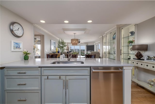2967 S Atlantic Ave Unit 301, Daytona Beach Shores, FL 32118 - kitchen featuring stainless steel dishwasher, a sink, gray cabinets, light countertops, and recessed lighting