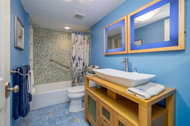 2967 S Atlantic Ave Unit 301, Daytona Beach Shores, FL 32118 - bathroom with shower / tub combo, toilet, vanity, tile patterned flooring, and recessed lighting