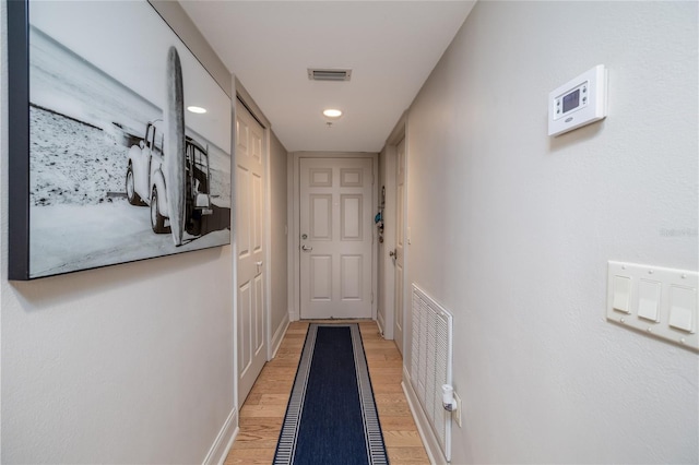 2967 S Atlantic Ave Unit 301, Daytona Beach Shores, FL 32118 - entryway with light wood finished floors, baseboards, and recessed lighting