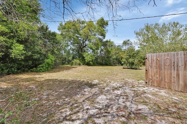 view of yard with fence