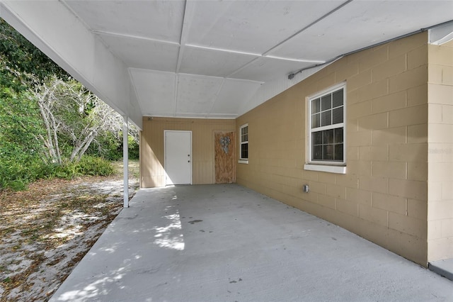 view of patio / terrace featuring a carport