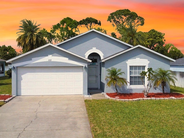 209 Oak Branch Dr, Edgewater, FL 32141 - ranch-style house featuring a lawn, concrete driveway, a garage, and stucco siding
