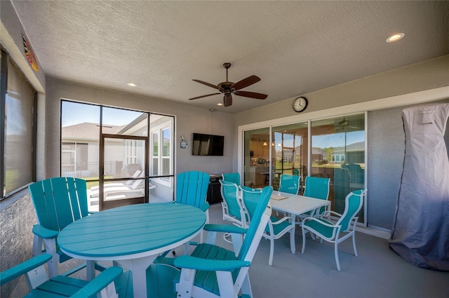 418 Aquamarine Way, Daytona Beach, FL 32124 - sunroom with a ceiling fan and outdoor dining area