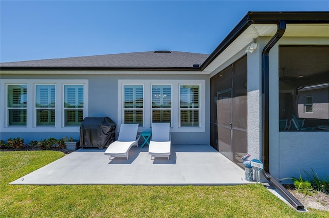 418 Aquamarine Way, Daytona Beach, FL 32124 - view of patio featuring a sunroom and a grill